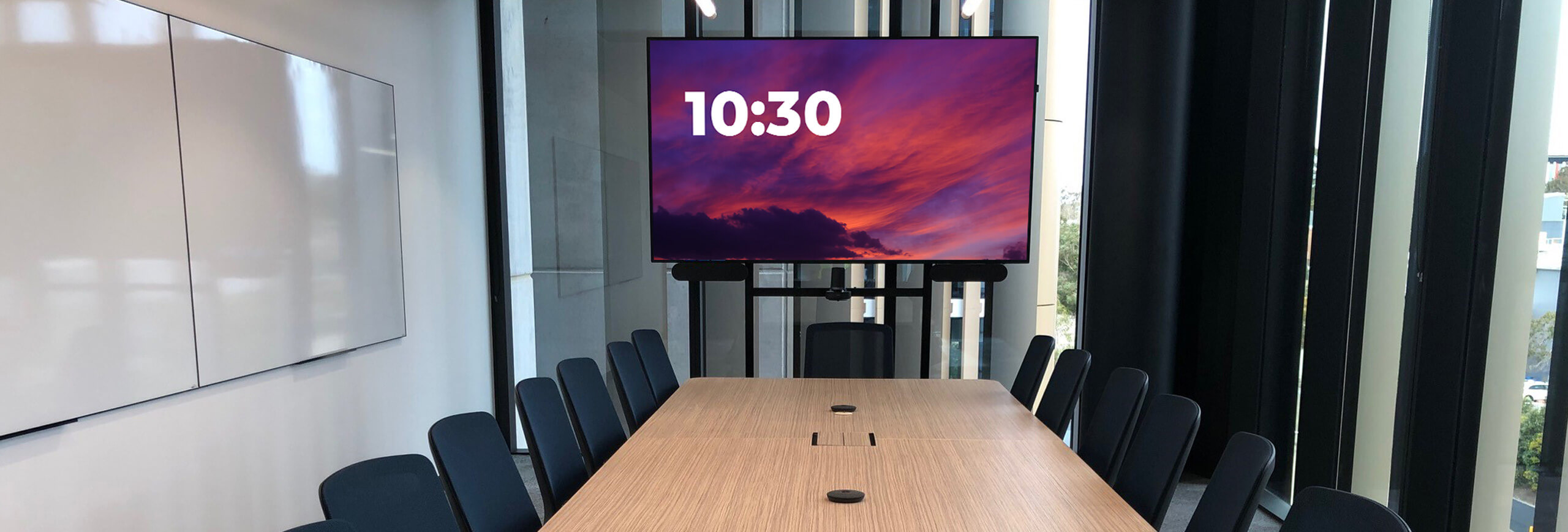 Biogen video conference room with main display screen