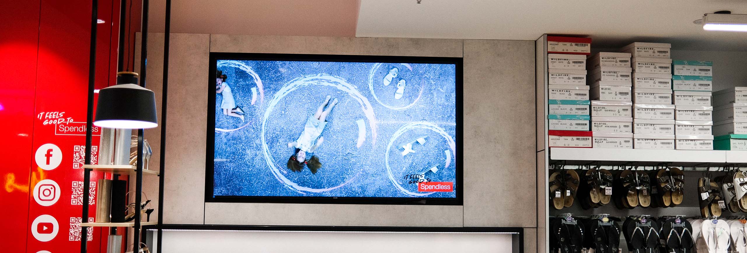 Spendless shoes digital screen inside the store