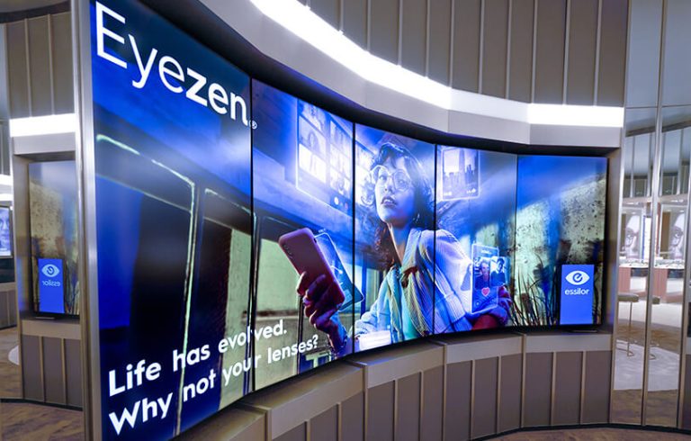 EssilorLuxottica curved LCD screens inside their store