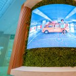 A curved and outward facing LED screen at Telstra Chadstone