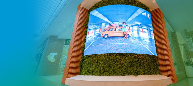 A curved and outward facing LED screen at Telstra Chadstone